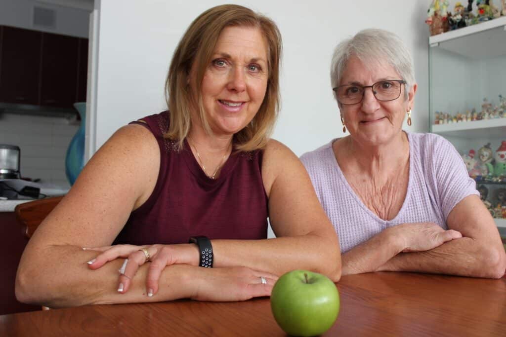 Healthy and Active for Life Online phone coach Lisa Buechel (left) meets participant Dianne Swinnerton.