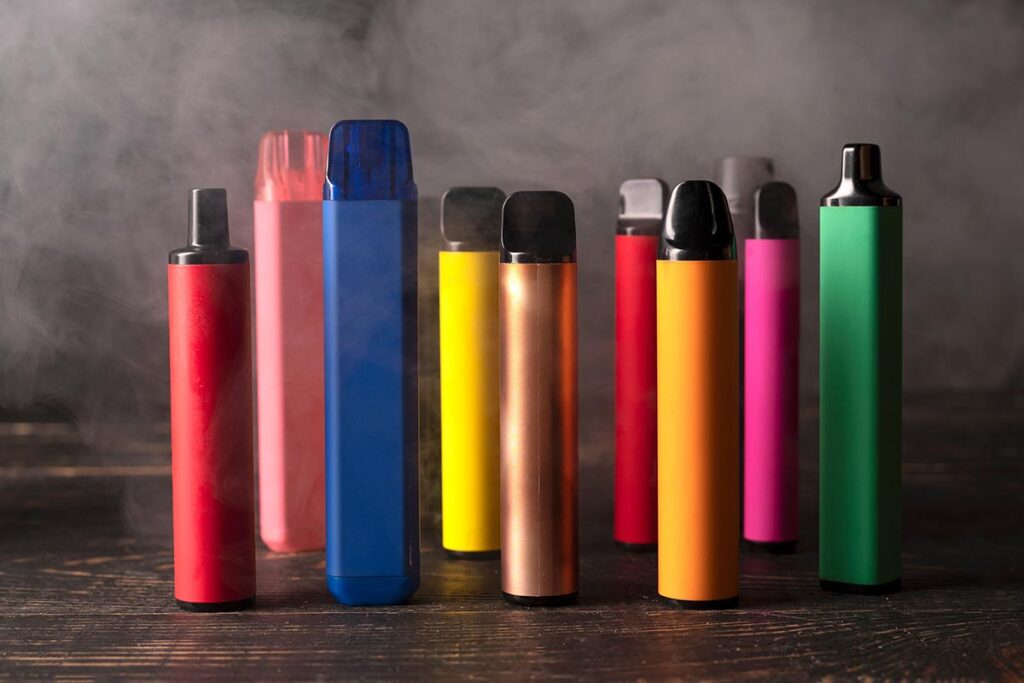 A collection of vapes in various colours.