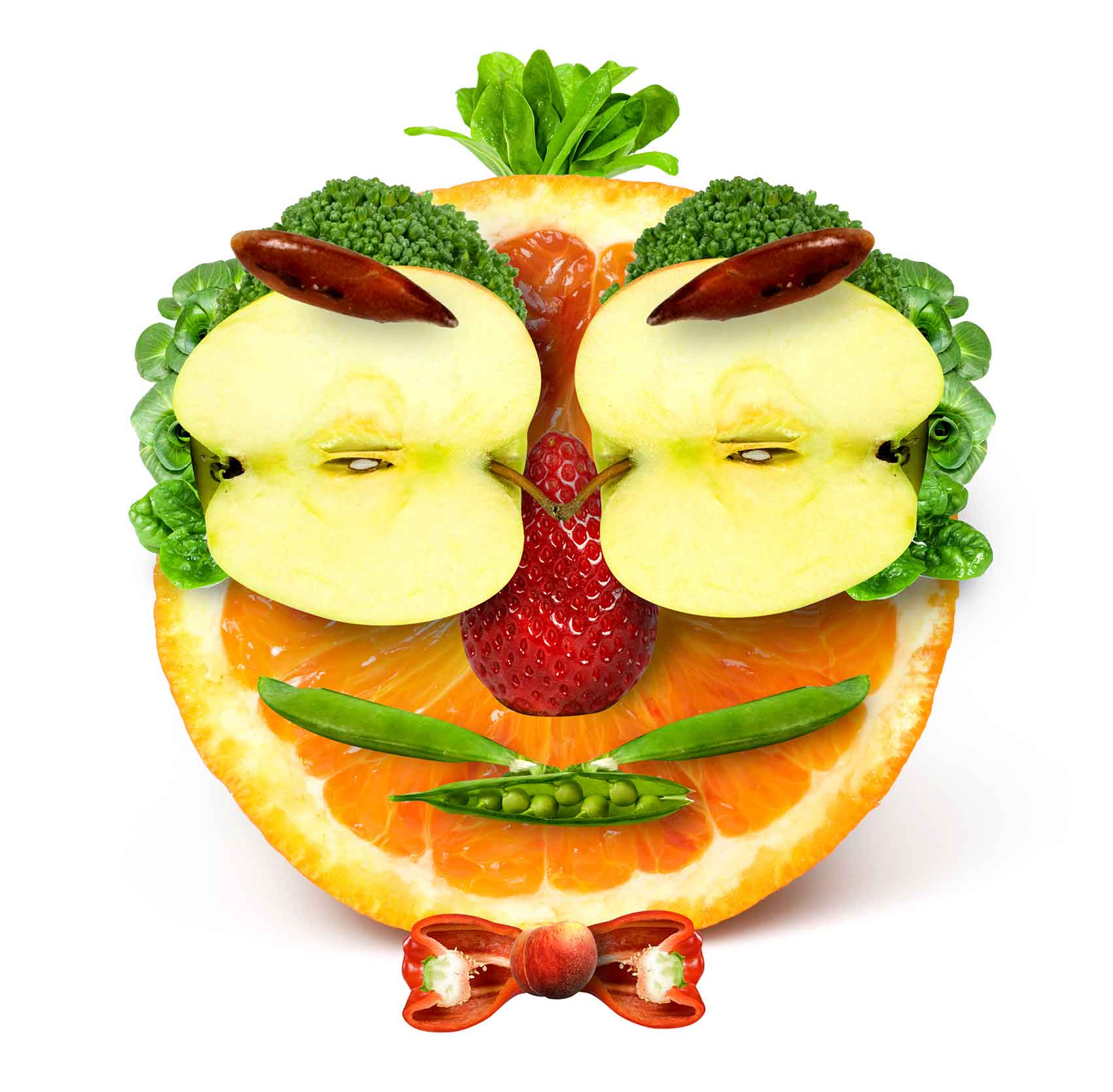 A humorous face made from various fruit and vegetables.