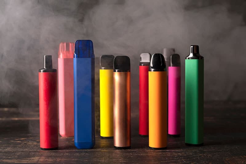 A collection of vapes in various colours.