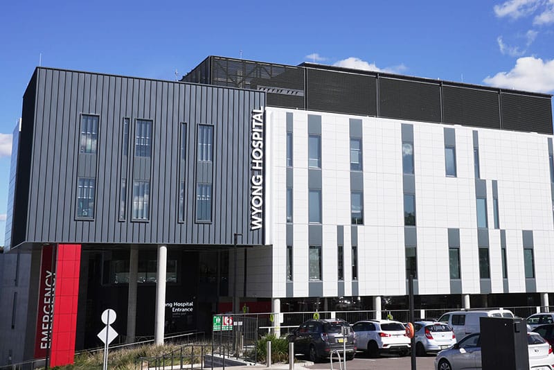 A picturesque image of Wyong Hospital with blue skies in the background.